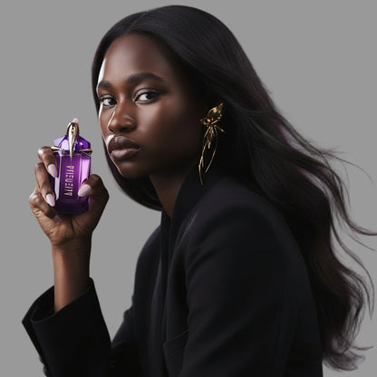 Woman holding a perfume bottle with a purple cap against a light grey background