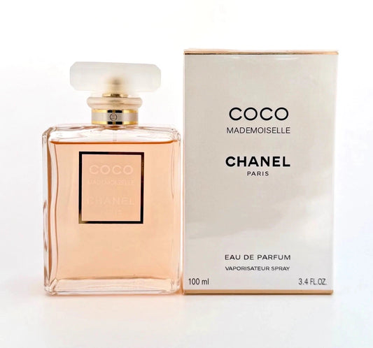 Chanel Coco Mademoiselle perfume bottle and packaging on a white background