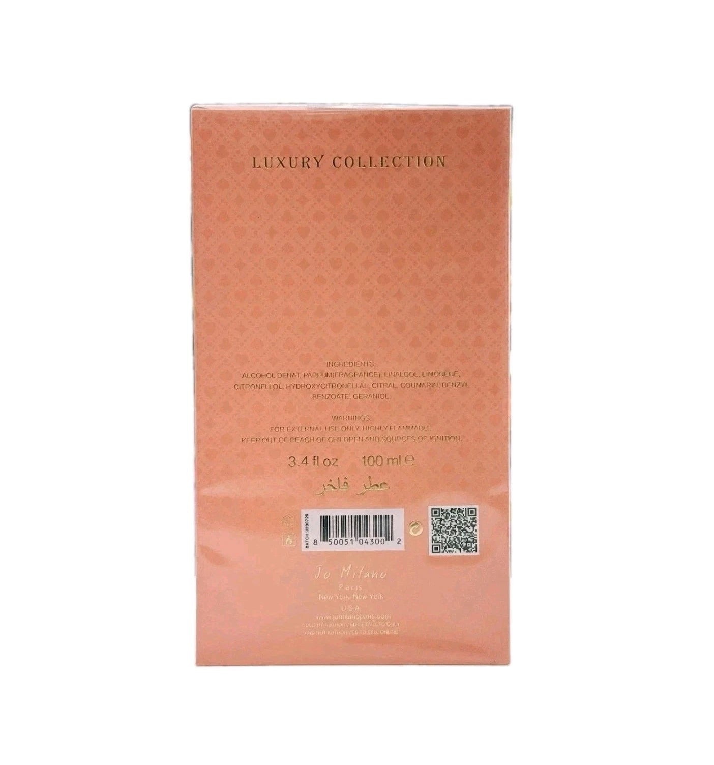 The back of a peach-colored perfume box from the Luxury Collection by J'Anouk, featuring product details, a barcode, and a QR code on a white background.
