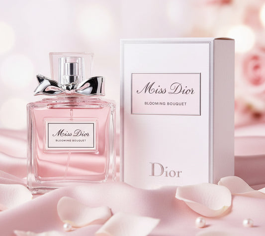 Miss Dior perfume bottle and box on a pink classy background 
