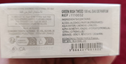 Product packaging held in a hand with a red background