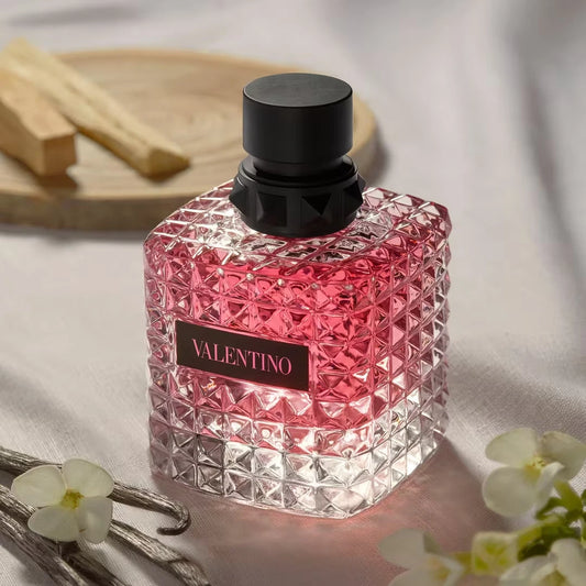 Valentino perfume bottle with a diamond pattern on a light background